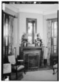 FIRST FLOOR LIBRARY FIREPLACE, NORTHWEST SIDE, BAY WINDOW. IT IS AMONG THE HOUSE'S MOST IMPORTANT FEATURES. ALSO NOTE ORIGINAL WALNUT CURTAIN RODS, HOLDERS AND INTERIOR HABS TENN,57-JACSO,2-15.tif