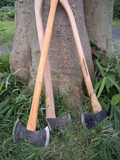 Axe Weapon or tool consisting of a shaft, usually of wood or metal, with a head attached at a right angle that is used primarily for chopping, splitting, or shaping wood and similar materials