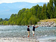 Fishing for stocked trout in Wyoming Fishing in Snake River.jpg
