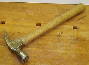 22-ounce wooden-handled framing hammer with mi...