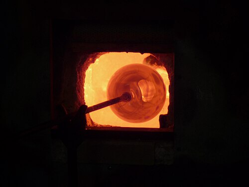 Glassblowing, heating the glass sphere in the oven