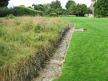 Remains of the reredorter at Glastonbury Abbey Glastonbury Abbey reredorter.jpg