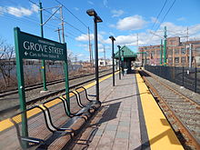 A Newark Light Rail station. As opposed to traditional streetcars, modern light rail systems typically run on reserved track, and often use railway platforms instead of street-level stops. Grove Street Station - April 2015.jpg