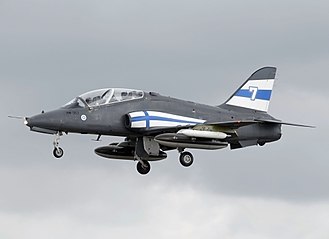 BAe Hawk 51 of the Finnish Air Force display team (the Midnight Hawks) arrives at the 2017 RIAT, England. The blue and white livery for the 2017 season commemorates the 100th year of Finland's independence from Russia. Hawk 51 (HW-352) of the Finnish Air Force arrives RIAT Fairford 13July2017 arp.jpg