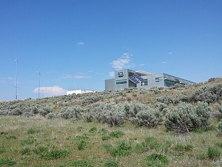 The Idaho National Laboratory, the University of Idaho, Idaho State University, Boise State University, and the University of Wyoming have labs, classrooms, offices, and other facilities just north of downtown. Among these partnerships is the Center for Advanced Energy Studies (CAES), shown here, which overlooks the Snake River.