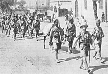 British Indian Army infantry divisions in France; these troops were withdrawn in December 1915, and served in the Mesopotamian campaign. Indian forces on their way to the Front in Flanders - first world war 2.jpg