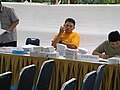 Officials overseeing ballot papers at a Jakarta polling station