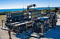 Italian Army - 4th Anti-aircraft Artillery Regiment "Peschiera" SAMPT missile reloading (cropped).jpg