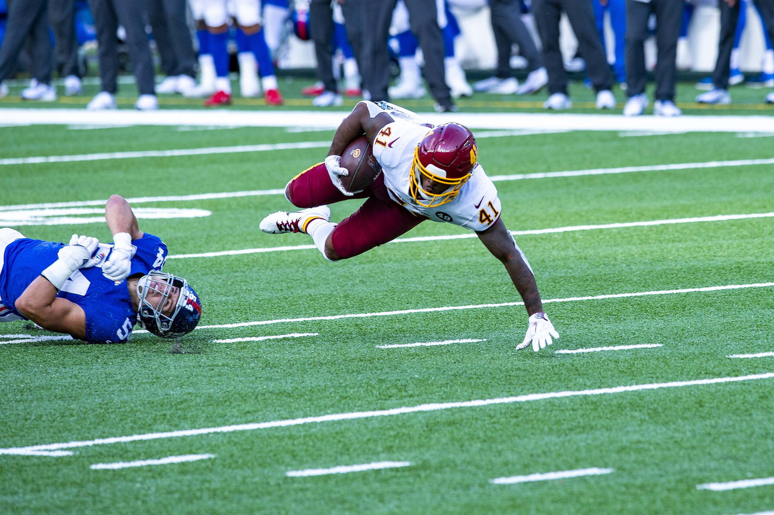 J.D. McKissic of the Washington Football Team dives for a