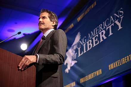 Stossel speaking at the New York City Spring Summit of Young Americans for Liberty