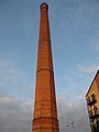 Junction Mills chimney viewed from the Ashton Canal Taken on 9 Aug. Uploaded by me on 29 Dec 2009.