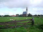 Ziech op 't dörp Den Hoorn mèt 't kèrkske en de veur Texel typerende sjäöp