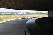English: Mausoleum at Majdanek deathcamp i Lublin with the camp in the background