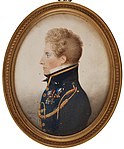 Magnus von Rosen iklädd Uniform m/1810 för en kapten i Generalstaben, samt bärandes på bröstet riddartecknen för Svärdsorden och Sankt Vladimirs orden samt medaljen För tapperhet i fält i guld. Målning från 1817 av Jacob Axel Gillberg.