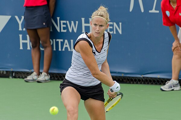 Mathilde Johansson returning a shot at the 2011 Connecticut Open qualifying tournament