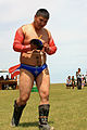 * Nomination Wrestler after a fight. Traditional Mongolian wrestling during the local Naadam festival. Kharkhorin, Övörkhangai Province, Mongolia. --Halavar 17:58, 12 November 2014 (UTC) * Decline  Oppose Insufficient quality. IMO too unsharp and crop (bottom) could be better. Face in the shadow too. --XRay 15:48, 15 November 2014 (UTC)