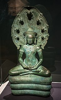 12th century Khmer bronze Naga-enthroned Buddha from Banteay Chhmar, Cambodia. Cleveland Museum of Art.