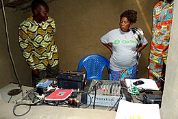 Oxfam East Africa - Radio stations help spread the mesnani tests the quality of water from a wellsage.jpg