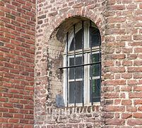 Barred window in the Paterskerk in Rekem