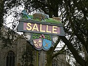 The Salle village sign