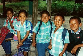 Children in school uniform in Bigi Poika, November 2002