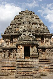 Shrine outer wall with projecting minor shrine (aedicula) in Lakshmi Narasimha temple at Nuggehalli Shrine outer wall with projecting minor shrine (aedicula) in Lakshmi Narasimha temple at Nuggehalli.JPG