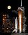 Space Shuttle Discovery under a full moon, 03-11-09.jpg