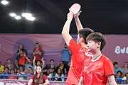 Deutsch: Tischtennis bei den Olympischen Jugendspielen 2018; Tag 9, 15. Oktober 2018; Mixed, Finale, Mixed-Doppel – Miu Hirano & Tomokazu Harimoto (JPN) gegen Sun Yingsha & Wang Chuqin (CHN) 1:3 English: Table tennis at the 2018 Summer Youth Olympics at 15 October 2018 – Mixed Final, Mixed-Double – Miu Hirano & Tomokazu Harimoto (JPN) Vs Sun Yingsha & Wang Chuqin (CHN) 1:3