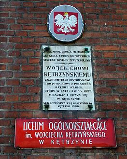 Tablica na dawnym gimnazjum w Kętrzynie, do którego W. Kętrzyński uczęszczał w 1855-59 (obecnie Liceum Ogólnokształcące jego imienia)