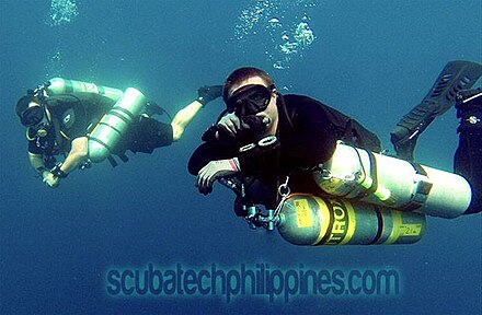 A technical sidemount diver as part of a mixed (backmount/sidemount) technical diving team