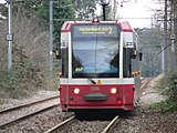 Tramlink tram 2536 approaches Morden Road tram stop with an eastbound route 2 service to Beckenham Junction station, 2006