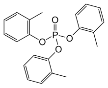 Tri-ortho cresyl phosphate(TOCP), also called tricresyl phosphate, was the neurotoxin responsible for the paralysis associated with "Jake Walk." Tri-o-cresyl phosphate.svg