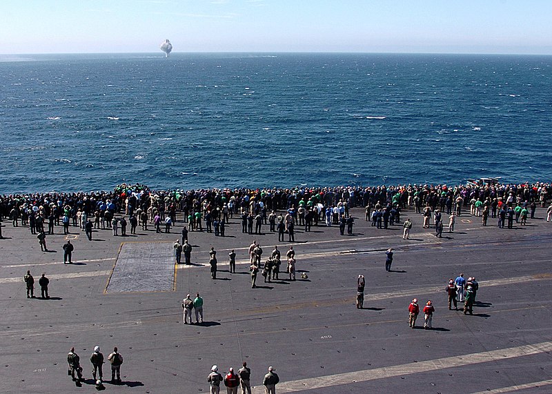 File:US Navy 050330-N-0535P-041 Sailors and Marines aboard USS Harry S. Truman (CVN 75) watch as an explosion in the distance marks the spot where an Mk-82 500 lb. bomb was dropped.jpg