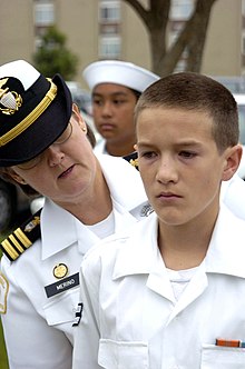 A NLCC cadet stands inspection. US Navy 051022-N-6843I-003 A member of the Navy League Sea Cadet Corps (NLCC) stands an uniform inspection.jpg