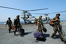 Troops from the 9th battalion, Sikh Light Infantry arrive aboard USS Boxer (LHD 4) to participate in Malabar 2006. Malabar 2006 is a multinational exercise between the U.S., Indian and Canadian armed forces to increase interoperability between the three nations and support international security cooperation missions US Navy 061025-N-0209M-002 Indian Soldiers assigned to the 9th Battalion of the Sikh Infantry arrive aboard USS Boxer (LHD 4) to participate in Malabar 2006.jpg