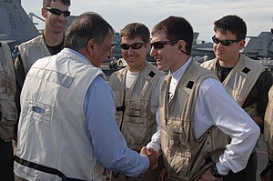 US Navy 120121-N-NC372-342 Secretary of Defense (SECDEF) Leon Panetta speaks to landing signal officers during flight operations aboard the aircraf.jpg