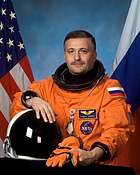 Seated Russian astronaut
