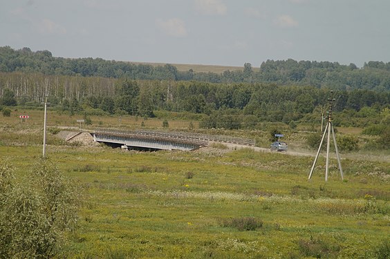 Road bridge over Alambay River in Kokorsky village, Altai Krai