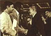 Han Sorya meeting Americans in 1952. Han's best known work, Jackals, and legacy is known for anti-Americanism.