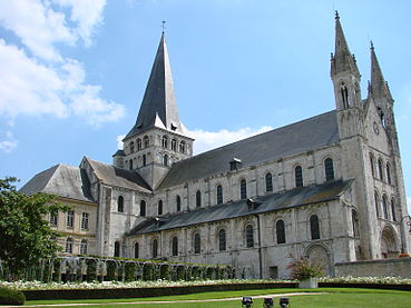Saint-Georges de Boscherville Abbey, France, has a square tower over the crossing. The western pinnacles are in the Gothic style.