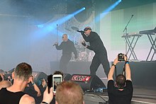 Foto dei Front 242 che suonano dal vivo all'Amphi festival 2014