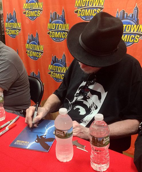 Miller signing a copy of the book during a 2016 appearance at Midtown Comics