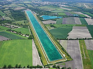 19. Platz: Carsten Steger mit Luftbild der Regattastrecke Oberschleißheim in Oberschleißheim im Landkreis München und München-Feldmoching