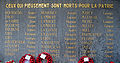 Pierre gravée portant les noms des 34 civils belges.