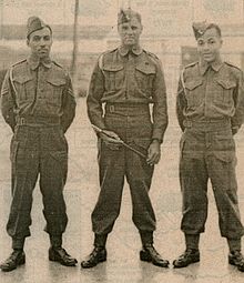 Bermuda Militia Artillery warrant officer and NCOs at the St. David's Battery, ca. 1944. Left-to-right: Bdr. A. Caisey, Sgt. Maj. R.C. Smith, and Bdr. C.E. Esdaille. Bermuda Militia Artillery Senior Ranks 1944.jpg