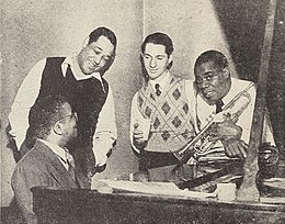 Billy Strayhorn, Duke Ellington, Leonard Feather, and Louis Armstrong, 1946.jpg