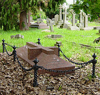 Bret Harte's gravestone in the churchyard of St Peter's Church, Frimley, Surrey, England