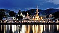 Reflections on the water surface of the lake in front of Wat Chong Klang, a temple in Mueang Mae Hong Son