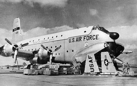 63d TCW C-124 at Hamilton AFB, California being prepared to load a Lockheed F-104 Starfighter being transported to Formosa, 1958