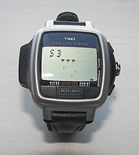 Datalink USB Dress edition with Invasion video game wrist app. (Three lives remaining). The watch crown (i-control) can be used to move the defender left to right and the fire control is the Start/Split button on the lower side of face of the watch at 6 o' clock. The pixels of the invaders appear slightly blurred upon picture magnification because of the animation of the aliens. The faint pixels diagonally to the left of the defender block are pixel traces of alien missiles. Datalink USB Dress Edition.JPG